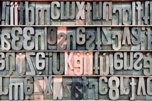Wood type letters organized in rows.